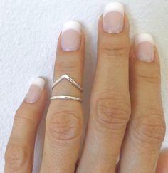 Sterling silver knuckle ring ∙ Stacking rings ∙ Midi rings ∙ Mid finger ring ∙ knuckle ring set ∙ Silver rings For people with misaligned fingers or joints, wearing a lateral deviation ring is advantageous. It offers assistance, aids in deviation correction, and encourages perfect alignment, so easing discomfort and enhancing general hand function and dexterity. A splint ring is a medical accessory made to support and stabilise fingers or joints that have been hurt or have become weak. It is a crucial tool for injury recovery and rehabilitation since it aids in immobilisation, fosters healing, and provides comfort. 🖤 Product Details: Handmade Item Material: 925 Sterling Silver Size: All sizes available. And can be Personalized  Style: Boho  We crafted these ring in pure Silver, and This S Minimalist Silver Jewelry For Summer, Trendy Silver Rings For Wedding, Trendy Silver Rings For Summer, Dainty Silver Stackable Rings With Open Band, Silver Open Ring Toe Rings, Simple Metal Open Ring Jewelry, Silver Metal Open Toe Rings, Adjustable Tiny Silver Midi Rings, Silver Minimalist Stackable Toe Rings