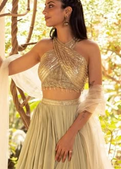 Top 50 Latest Halter Blouse Designs for Sarees and Lehengas (2023) - Tips and Beauty Halter Saree Blouse, Lehengas 2023, Western Blouse Designs, Halter Neck Blouse Design, Blouse For Saree, Lengha Blouse Designs, Netted Blouse Designs, Blouse Designs Catalogue, Latest Blouse Designs Pattern