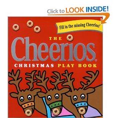 the cheerios christmas play book with reindeers on it's head and an orange background