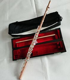 the flute is in its case and ready to be played