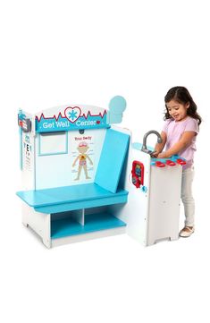 This sturdy, multisided wooden play space has everything kids need to role play visits to the doctor's office. This set features a waiting area with a seat, clock and changeable artwork. Kids can sign in and check out with a credit card reader, a reusable patient file and make appointments with the wooden phone. Then they can wash up in the sink, display X-rays, monitor blood pressure, tip the scale, measure height and read the eye chart. Style Name:Melissa & Doug Get Well Doctor Activity Ce Credit Card Reader, Wooden Playset, Doctor's Office, Activity Center, Candy Brands, Window Cards, Doc Mcstuffins, Waiting Area, Melissa & Doug