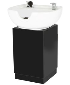 a white sink sitting on top of a black pedestal