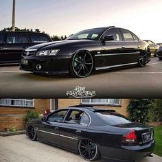 two cars parked next to each other in front of a house and another one is black