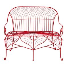 a red metal bench sitting on top of a white background