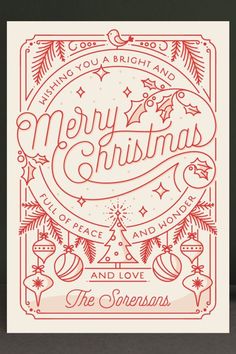 a christmas card with the words merry and love in red ink on white paper, surrounded by