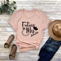 Future Mrs Shirt, Custom Future Mrs Shirt, Bride Gift, Engagement Gift, Fiance Tee, Bachelorette Party Shirt, Personalized Future Mrs Shirt NOTE: We use black design for White, Light Grey Heather( Athletic Heather), Pink, Heather Peach, Mint Green, Burnt Orange colors. For other colors we will use white design. Hello! First of all thank you for being here and checking out our finest t-shirt designs. As Mudo Boutique, we dedicated ourselves to provide the best possible service for our valuable cu Future Mrs Shirt, Bachelorette Party Shirt, Mrs Shirt, Studio Photography Poses, Future Mrs, Burnt Orange Color, Bachelorette Party Shirts, Bride Gift, Party Shirts