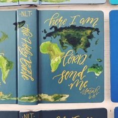 there are many books that have different designs on them, and one is blue with gold lettering