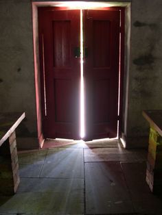 an open door with light coming through it