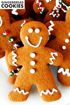 a plate full of gingerbread cookies with sprinkles on them and the words gingerbread cookies above it