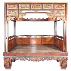 This is a wonderful example of a canopy bed from Shanghai Province, China. Made of Chinese Northern Elm, this bed features hoofed feet and multiple floral carvings. The exterior is heavily decorated with gold leafing, carvings, ornate carved figurine pillars, and delicate fretwork. The interior features eight, hand-painted, ornately designed panels, a woven reed bed/mattress platform, and a low chest with two drawers on each side. Chinese Bed, Deck Canopy, Wedding Bed, Canopy Architecture, Backyard Canopy, Wedding Canopy, White Canopy, Steel Canopy, Fabric Canopy