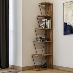 a bookshelf in the corner of a room with a painting on the wall