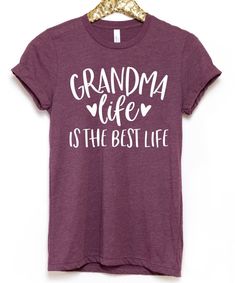 a t - shirt that says grandma life is the best life hanging on a hanger