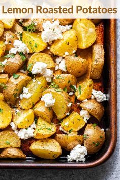 roasted potatoes with lemon and feta cheese in a casserole dish