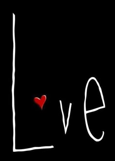 the word love written in white chalk on a black background with a red heart inside