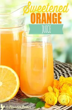 orange juice in a pitcher and two glasses with flowers