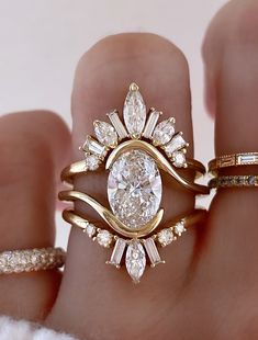 caption:Shown with 1.5ct oval diamond in 14k yellow gold Oval Ring Stack, Ballerina Engagement Ring, Disney Engagement Rings, Bypass Engagement Ring, Sunburst Ring, Stone Shapes, Dream Rings, Lab Diamond Engagement Ring, Unique Diamond Rings