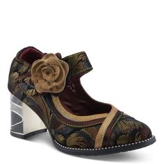 a women's shoe with a flower on the heel and an open toe design