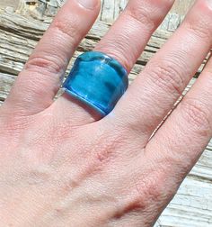 Murano glass ring made with transparent colors. This ring is easy to wear, comfortable and wraps elegantly your finger. The shape is a flat band measuring approximately 25mm-27mm. size could vary as it is handmade. If you like BIGGER RINGS opt for this listing:https://www.etsy.com/listing/724649203/murano-glass-ring-big-glass-rings? Size: US Size 5-6-7-8-9 If you need a different size/color feel free to contact us. Chose your size in the drop down menu and we will make one for you. Please note t Modern Resin Rings For Gifts, Unique Clear Resin Ring, Unique Clear Resin Rings, Handmade Clear Rings For Gifts, Modern Glass Rings Suitable For Gifts, Unique Clear Round Rings, Unique Clear Rings, Adjustable Handmade Clear Ring, Unique Blue Resin Rings