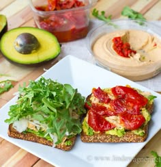 avocado, tomato and lettuce sandwich on toasted bread with ketchup