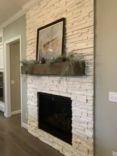 a white brick fireplace in a living room