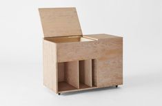 a wooden box with two open compartments