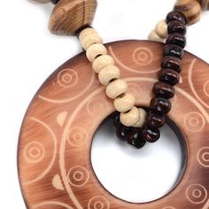 No clasp Necklace: 30"Circle Pendant Size: 2.25" See more: No Clasp Collection Dangle Necklace, Wooden Necklace, Clasp Necklace, Dangle Necklaces, Circle Pendant Necklace, Beaded Pendant Necklace, Wooden Pendant, Long Pendant Necklace, Raw Wood