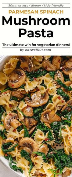 mushroom pasta with spinach and parmesan cheese in a white casserole dish