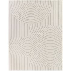 a white rug with circles and lines on the floor, in front of a white background