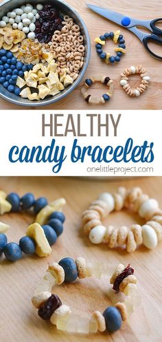 an assortment of candy bracelets on a wooden table with scissors and other candies