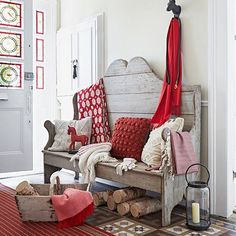 a living room filled with lots of furniture and decor on top of a red rug