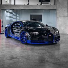 a bugatti car is parked in a garage