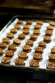 there are many cookies on the baking sheet