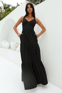 Length from shoulder to hem of size S: 146cm. 
 Chest: 38cm, Waist: 34cm, size S. 
 Maxi dress. 
 Semi-lined. 
 Model is a standard XS and is wearing size XS. 
 True to size. 
 Non-stretch. 
 V-neck. 
 Flowy skirt. 
 Crisscross back. 
 Inseam side pockets. 
 Split. 
 Zipper with hook eye closure.  
 Cold hand wash only. 
 Main: Cotton Lining: Polyester/Spandex. 
 
 
 
 
 
 
 
 
 
 
 
 
 Please note: This style is exclusive 
 
 
 
 
 
 
 
 
 
 
 
   
 
 
 Bring the classiest vibes Polished Beauty Long Black Flowy Dress, Black Flowy Dress, Staple Wardrobe, First Day Outfit, Flowy Design, Inspo Pics, Maxi Dress Black, Shower Dresses, Jumpsuits And Romper