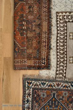 three different rugs laid out on the floor