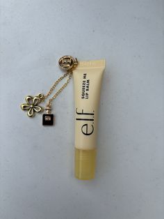 These are adorable little charm lip balms! The charms will be different from the ones shown in the picture, which is why it is important that you fill out the personalized section. Lip Gloss With Charms, Lip Balm Charm, Lip Gloss Charms, Lip Balm Aesthetic, Glossier Lip Balm, Lip Gloss Balm, Handbag Essentials, Beauty Make-up, Cream Aesthetic