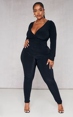 The Plus Black Wrap Front Long Sleeve Catsuit | Head online and shop this season's range of Plus Size at PrettyLittleThing. Express shipping available. Plus Size Catsuit Outfit, Black Catsuit Outfit, Catsuit Outfit, Black Catsuit, Black Playsuit, Flare Jumpsuit, Human Reference, Black Wrap, Clear Heels