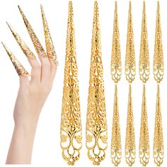 PRICES MAY VARY. EXQUISITE QUEEN NAIL APPEARANCE: This set of finger nail tip claw rings are specially designed like queen in ancient times, long sharp end with golden color finish, very imposing and attractive among people. PREMIUM MATERIAL: These fingertip claw nail rings are made of high quality material, non-faded , rustproof and sturdy for long time use. Please leave it away from water when wearing or putting aside. WONDERFUL DECOR GIFT: This finger nail rings has a stylish design and appea Claw Rings, Nail Armor, Queen Halloween Costumes, Nail Rings, Ancient Queen, Queen Nails, Claw Nails, Claw Ring, Queen Costume