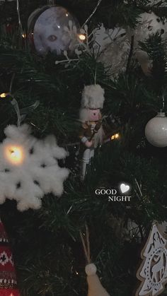 a christmas tree decorated with ornaments and lights