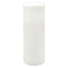 a white vase sitting on top of a table