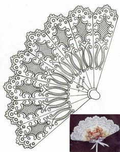 an intricately designed lace fan is shown in the shape of a handmade flower