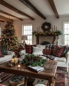 a living room filled with furniture and christmas decorations