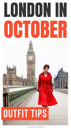 a woman in a red coat standing on a bridge with big ben in the background