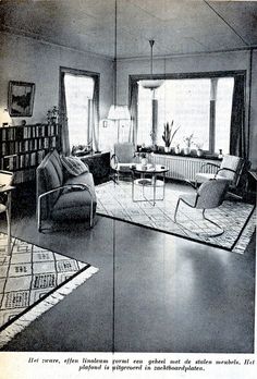 an old black and white photo of a living room