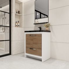 a bathroom with a sink, mirror and shower stall in the middle of the room