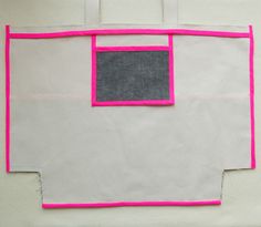 a piece of paper with pink trim on it