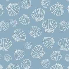 a blue background with white shells on it