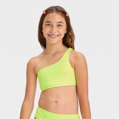 Brand New, Never Worn. Lime Green Bikini Swim Top Ribbed Design 4-Way Stretch One-Shoulder Design Upf 50+ Rated Fabric Recycled Polyester Your Kid Will Love Creating A Beach-Ready Look By Wearing The "Stay A While" Ribbed Bikini Swim Top From Art Class. This Lime Green Swim Top Features A One-Shoulder Design With Two Straps At The Back For A Beautiful Look. Providing Four-Way Stretch, This Ribbed Bikini Swim Top Offers The Right Flexibility For Watery Adventures. Plus, They'll Stay Shielded From Workout Attire, Claw Clips, Beach Ready, Kids Outfits Girls, Kids Swimming, Swimwear Girls, Shoulder Design, Swimwear Fashion, Swim Top