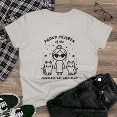 a t - shirt that says proud member of the children's cat garden club