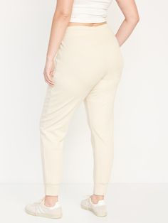 elastic-drawstring waist faux fly zippered hip pockets cuffed leg sits at belly button semi-fitted hip and thigh slim leg 27 1/2" regular inseam 25 1/2" petite inseam 30 1/2" tall inseam models are approx.  5'9" and wear sizes s (4), l (12), and xl (18) Elevated Casual Full-length Sweatpants With Elastic Waistband, Full Length Sweatpants For Elevated Casual Look, Mid-rise Bottoms With Side Pockets For Loungewear, Solid Bottoms With Elastic Side Panels And Loose Hips, Casual Mid-rise Joggers For Loungewear, Straight Leg Bottoms With Comfort Waistband, Tapered Leg Joggers With Pockets For Lounging, Comfortable Straight Leg Bottoms With Comfort Waistband, Elevated Casual Stretch Sweatpants With Pockets