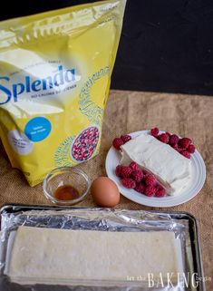 ingredients for cake sitting on a table next to a bag of splenda flour